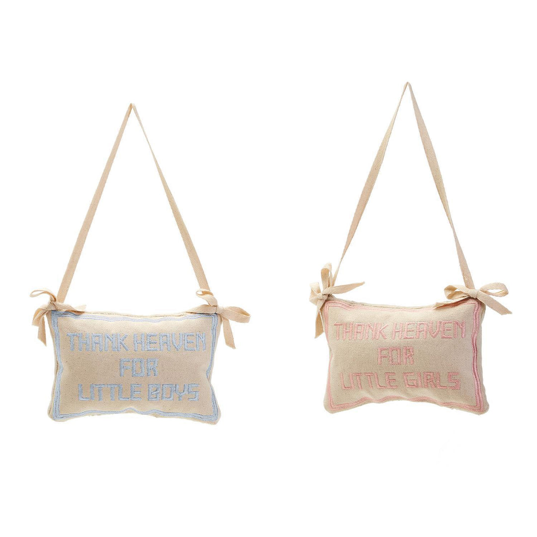 Two decorative pillows with text on a white background