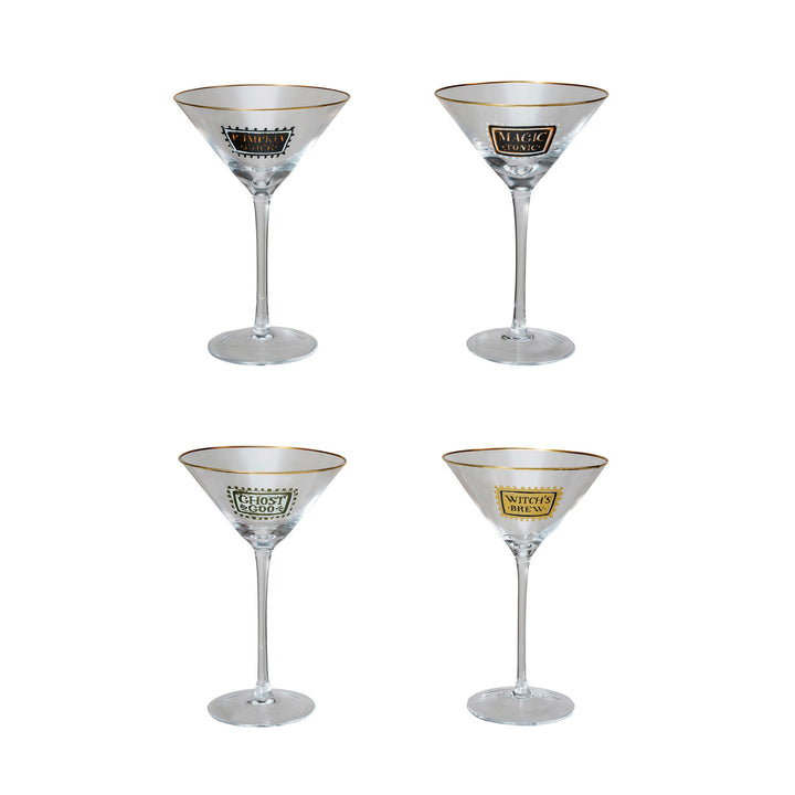 Four clear martini-style cocktail glasses arranged in a 2x2 grid on a white background. Each glass has a thin gold rim and a decorative label near the bowl: Magic, Gold Coin, and Whiskey are visible.
