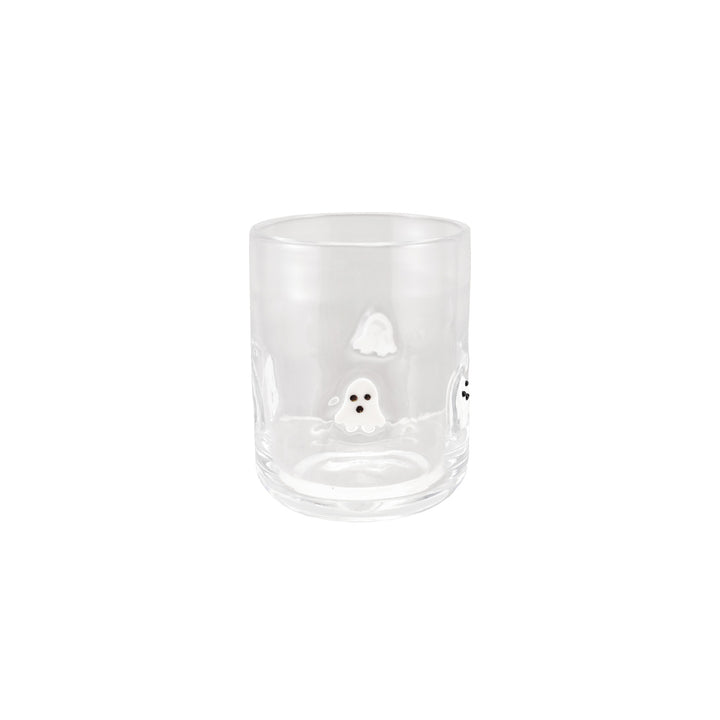 Clear glass tumbler with a small white design on a white background