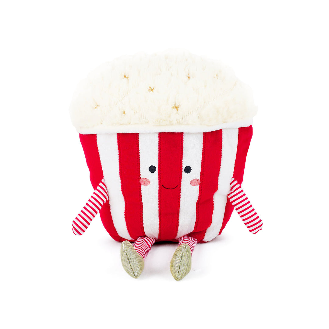 Plush toy resembling a striped popcorn container with a face on a white background