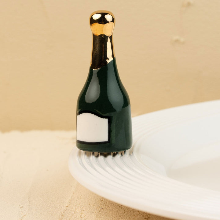 Champagne Celebration Mini by Nora Fleming — hand-painted ceramic champagne bottle ready to pop