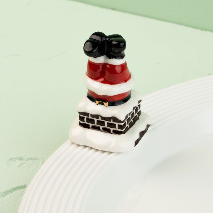 Down the Chimney Mini by Nora Fleming — hand-painted ceramic Santa's boots headed down the chimney (alternate view)