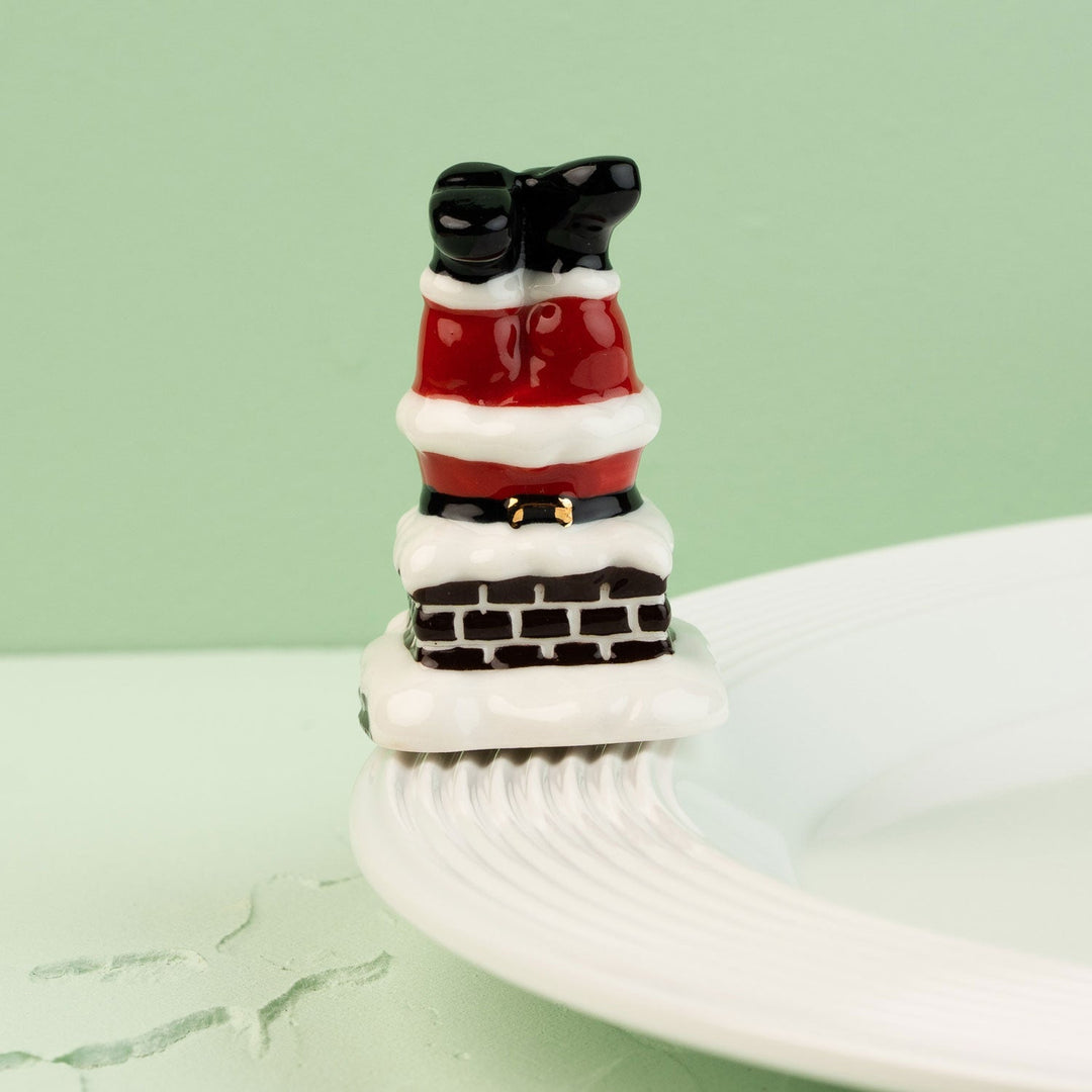 Down the Chimney Mini by Nora Fleming — hand-painted ceramic Santa's boots headed down the chimney