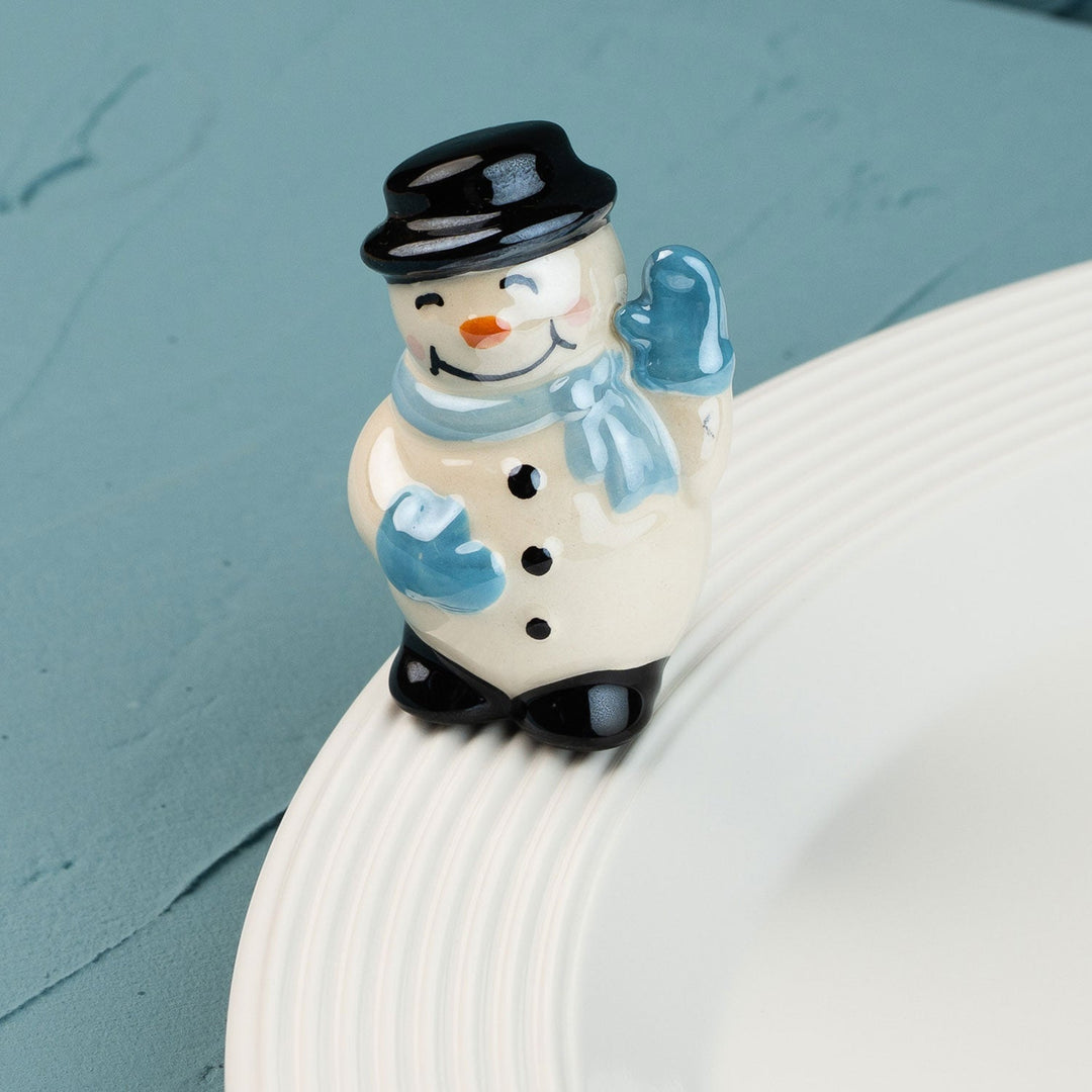 Frosty Pal Mini by Nora Fleming — hand-painted ceramic top-hatted snowman with a blue scarf (alternate view)