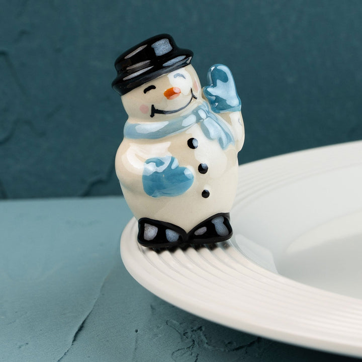 Frosty Pal Mini by Nora Fleming — hand-painted ceramic top-hatted snowman with a blue scarf