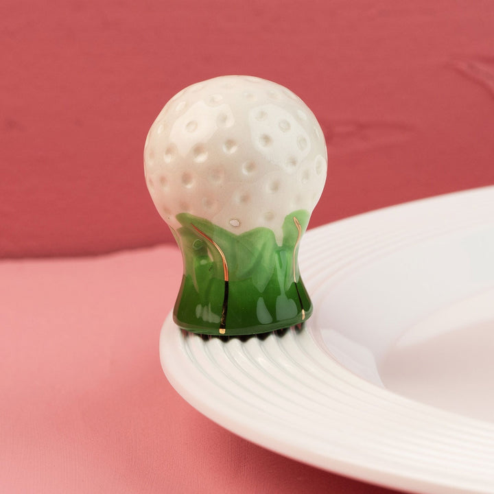 Hole in One Mini by Nora Fleming — hand-painted ceramic golf ball on its tee