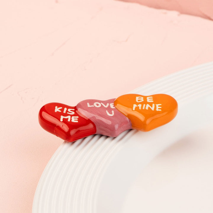 It's a Love Thing Mini by Nora Fleming — hand-painted ceramic stack of candy hearts