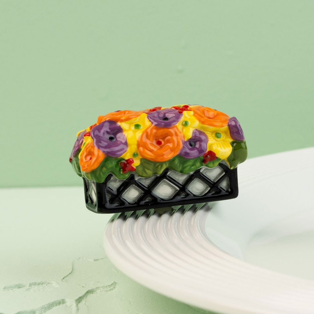 Love Blooms Here Mini by Nora Fleming — hand-painted ceramic window box in full bloom