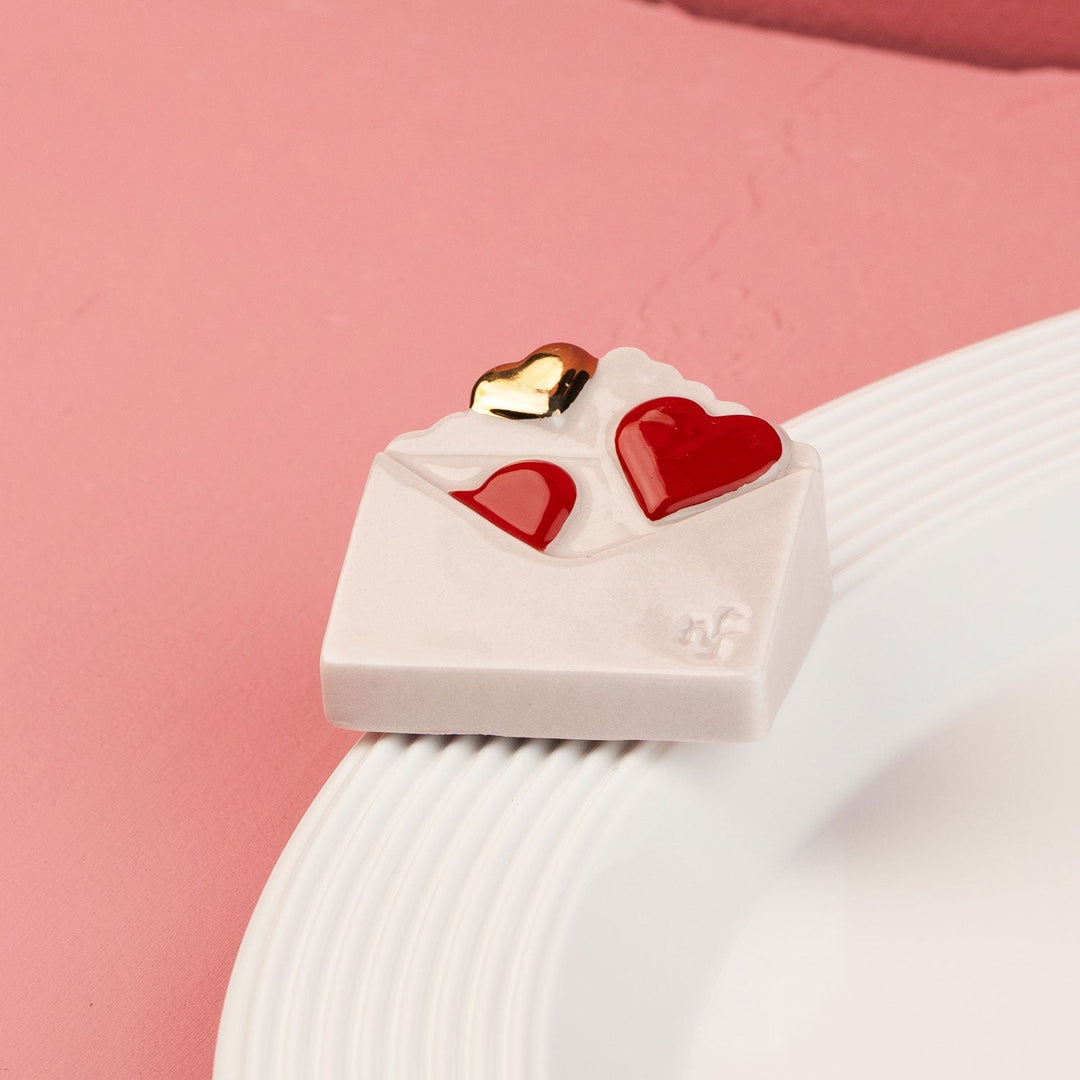 Love Notes Mini by Nora Fleming — hand-painted ceramic love-letter envelope sealed with hearts