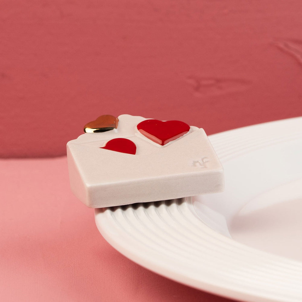 Love Notes Mini by Nora Fleming — hand-painted ceramic love-letter envelope sealed with hearts (alternate view)
