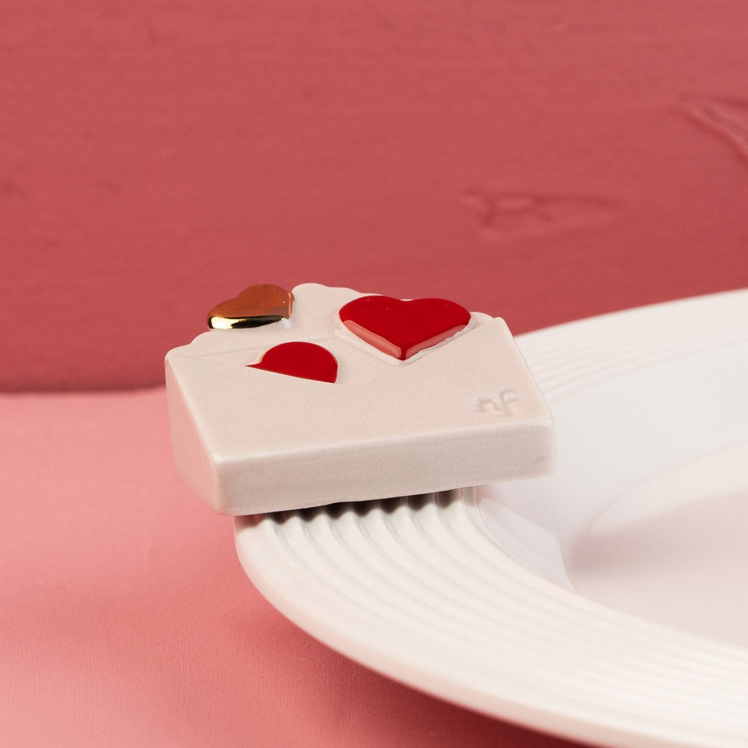 Love Notes Mini by Nora Fleming — hand-painted ceramic love-letter envelope sealed with hearts (alternate view)