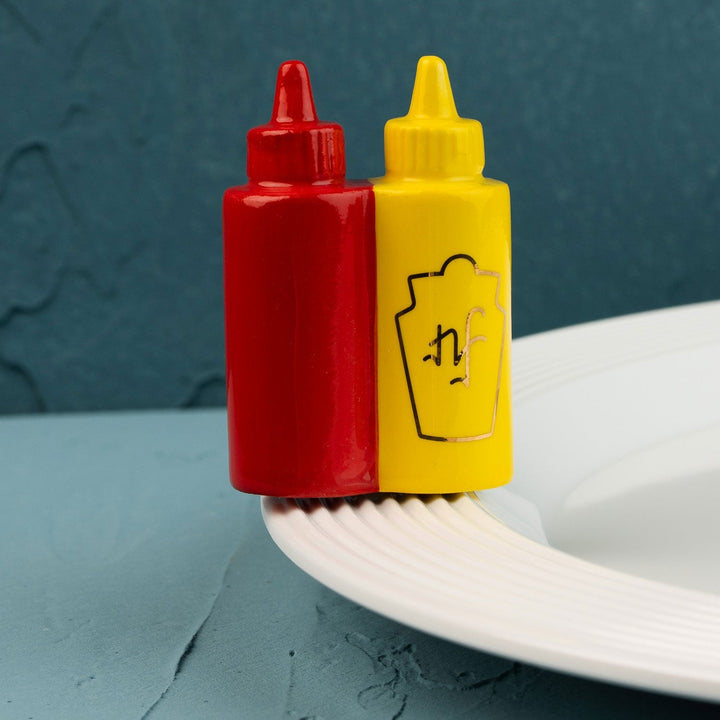 Main Squeeze Mini by Nora Fleming — hand-painted ceramic ketchup-and-mustard duo