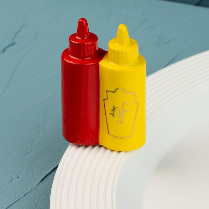 Main Squeeze Mini by Nora Fleming — hand-painted ceramic ketchup-and-mustard duo (alternate view)