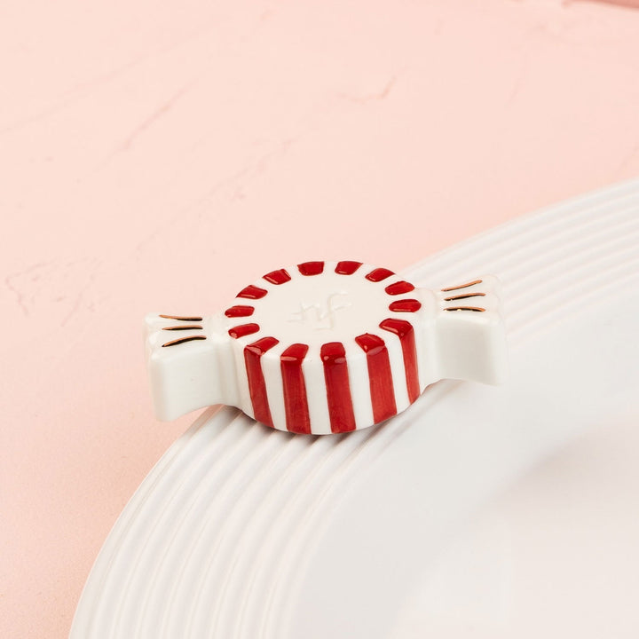 Peppermint Dreams Mini by Nora Fleming — hand-painted ceramic red-and-white peppermint swirl