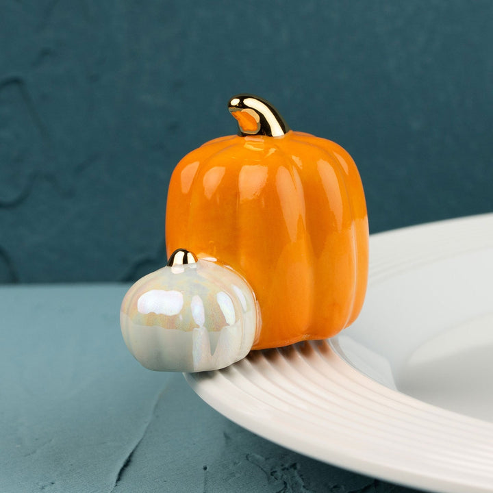 Pumpkin Spice Mini by Nora Fleming — hand-painted ceramic pair of pumpkins, one orange and one white