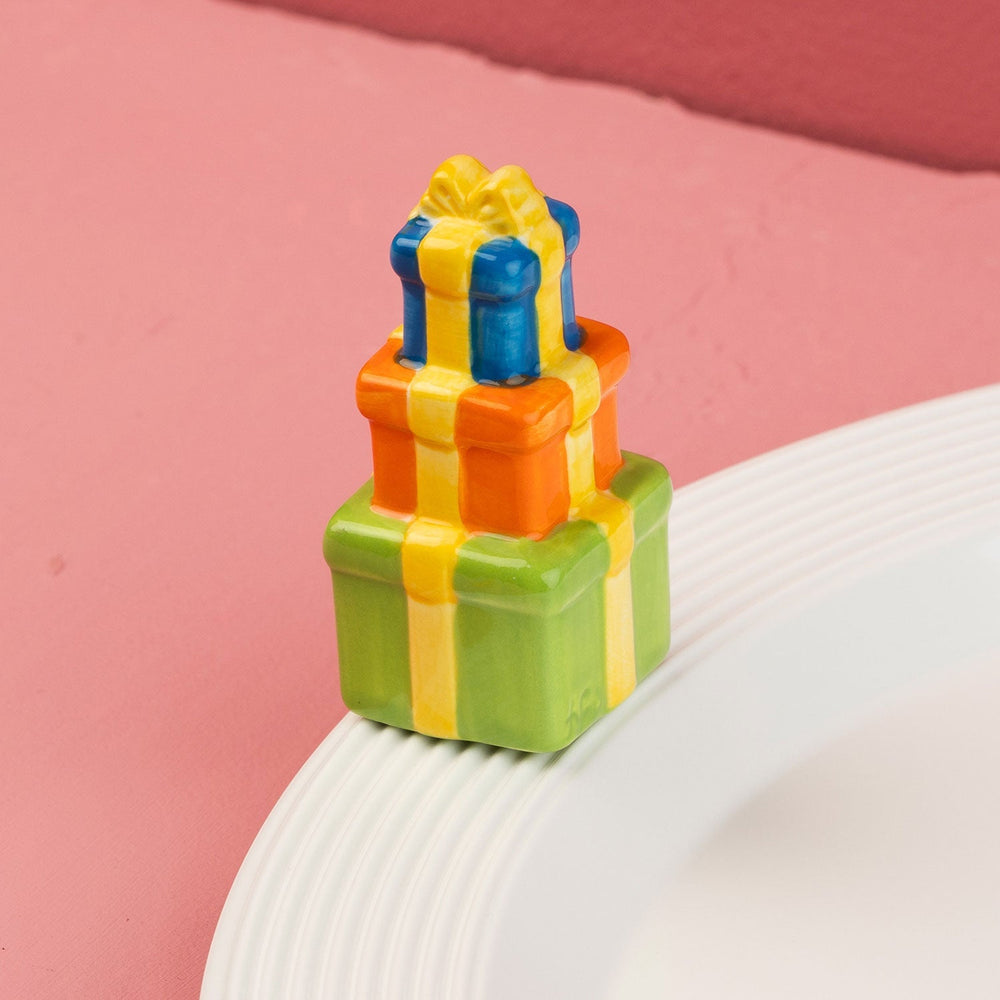 They're All For You Mini by Nora Fleming — hand-painted ceramic stack of wrapped presents (alternate view)